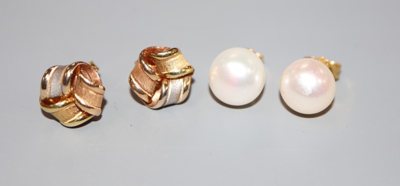A pair of 18ct three-colour gold stud earrings and a pair of 750 and cultured pearl stud earrings, gross 6.7 grams.